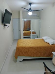 Postel nebo postele na pokoji v ubytování Residencial Estephany