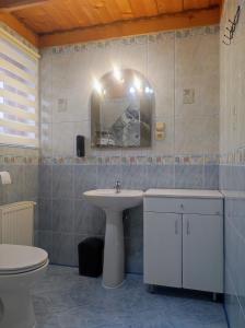 Kúpeľňa v ubytovaní Apartamenty Sosna