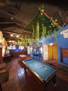a billiard room with a pool table in it at Pirwa Backpackers Colonial in Cusco