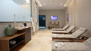 TV o dispositivi per l'intrattenimento presso Dominium Hotel