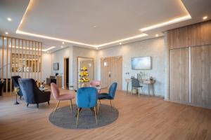 Area soggiorno di Dominium Hotel