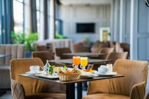 TV o dispositivi per l'intrattenimento presso Dominium Hotel