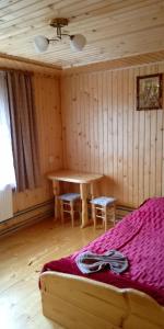 Postel nebo postele na pokoji v ubytování Смерека