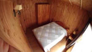 Postel nebo postele na pokoji v ubytování Los arrayanes de huife
