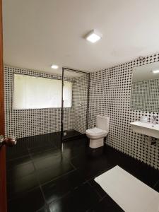 Een badkamer bij Magnolia Hideout