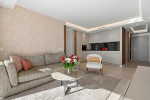 Posedenie v ubytovaní Beach front apartment with pool