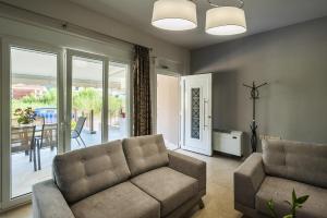 Zona d'estar a 4 Seasons Villas