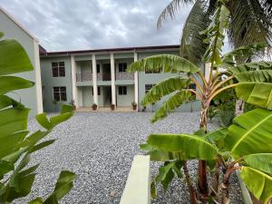 a view of a building with a courtyard at Connect Africa Apartments in Accra