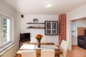 TV a/nebo společenská místnost v ubytování Apartmany Kosić