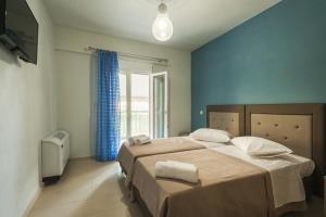 Кровать или кровати в номере 4 Seasons Villas