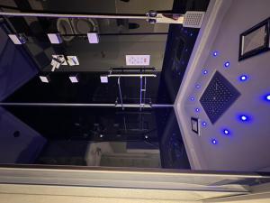 a room with a ceiling with blue lights at Domizil in Schleiden +10 photos