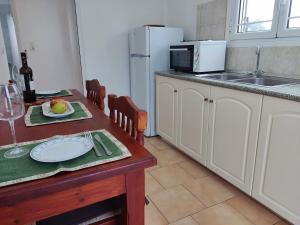 Kuchyňa alebo kuchynka v ubytovaní Coral Villas
