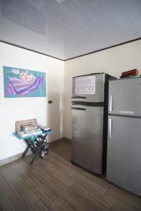 A cozinha ou kitchenette de Argdivan Hostel