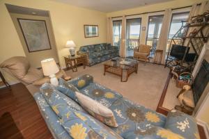 Ruang duduk di Harbor Island Beachside House