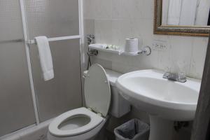 Um banheiro em Hotel Parador