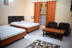 Postel nebo postele na pokoji v ubytování Hotel Golden