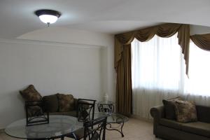 Uma área de estar em Hotel Parador