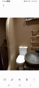 a bathroom with a toilet and a sink at Lux Studio 3 in Athens