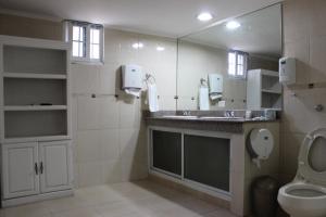 Um banheiro em Hotel Parador