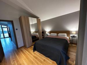 Ένα ή περισσότερα κρεβάτια σε δωμάτιο στο Idille2