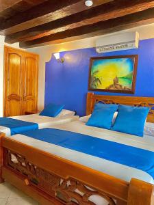 Voodi või voodid majutusasutuse Hotel Don Pedro De Heredia toas