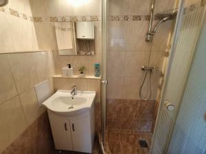 Koupelna v ubytování Hírös Home