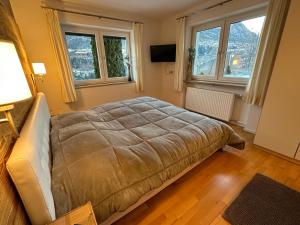 Postel nebo postele na pokoji v ubytování Ferienhaus Freizeit + 37 fotografií