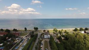 an aerial view of a city and the ocean at Apartmenthaus Seetempel in Scharbeutz