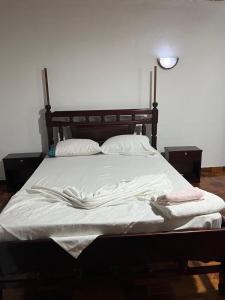 Postel nebo postele na pokoji v ubytování Elitineide Guest House