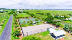an overhead view of a tennis court with a tennis court at Ocean Front D-Building - POOL ACCESS AND OCEAN VIEWS!!! in Harbor Island