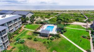 an aerial view of a resort property with a swimming pool at NEW LISTING! Ocean and Pool Views on Harbor Island - Short Walk to Pool and Beach in Harbor Island