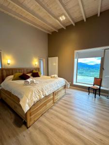 Кровать или кровати в номере Cabañas Hacia El Sur