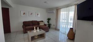 sala de estar con sofá y mesa en "Condominio Américas", en Boca del Río