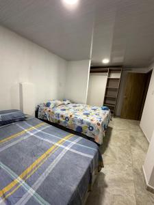 Postel nebo postele na pokoji v ubytování Casona La Española