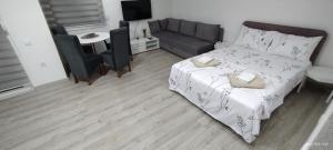 Postel nebo postele na pokoji v ubytování Soko apartments