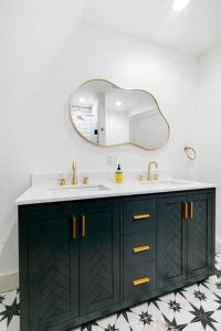 a bathroom with a sink and a mirror at Mtn Views + Fire Pit + Secluded in Westfield