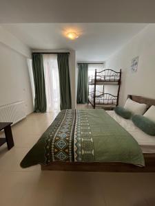 Cama o camas de una habitación en Gudauri Palace apartments in New Gudauri