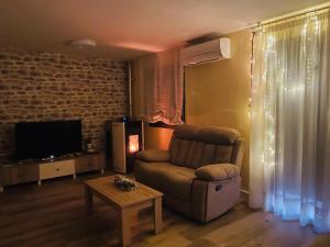 Гостиная зона в Apartamento Rural Mi Pequeña Lulú TR-CC-00564 +22 фотографии
