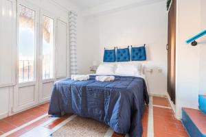 Posteľ alebo postele v izbe v ubytovaní Casa Edison