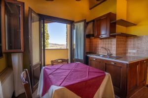 Kuchyň nebo kuchyňský kout v ubytování Agriturismo Buratta