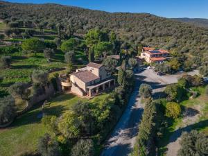 an aerial view of a house and a river at Agriturismo Buratta in Fonteblanda