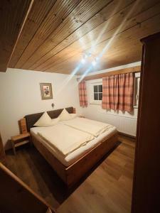 Postel nebo postele na pokoji v ubytování Arlerhof