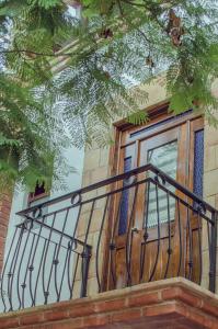 a stair railing in front of a window at Hotel Casa Mixteca in Huajuapan de León