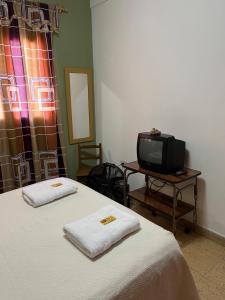 TV a/nebo společenská místnost v ubytování Casa Rústica Norteña Candy Con Parking