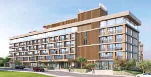 a rendering of a building with people walking in front of it at Park Inn by Radisson Yalova City Center in Yalova