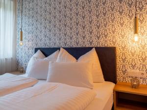Posteľ alebo postele v izbe v ubytovaní Kaminzimmer Suite