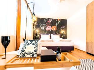 Posteľ alebo postele v izbe v ubytovaní Kaminzimmer Suite