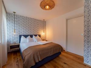 Posteľ alebo postele v izbe v ubytovaní Kaminzimmer Suite