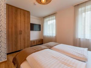 Posteľ alebo postele v izbe v ubytovaní Kaminzimmer Suite