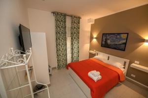 A bed or beds in a room at Living Salerno B&b